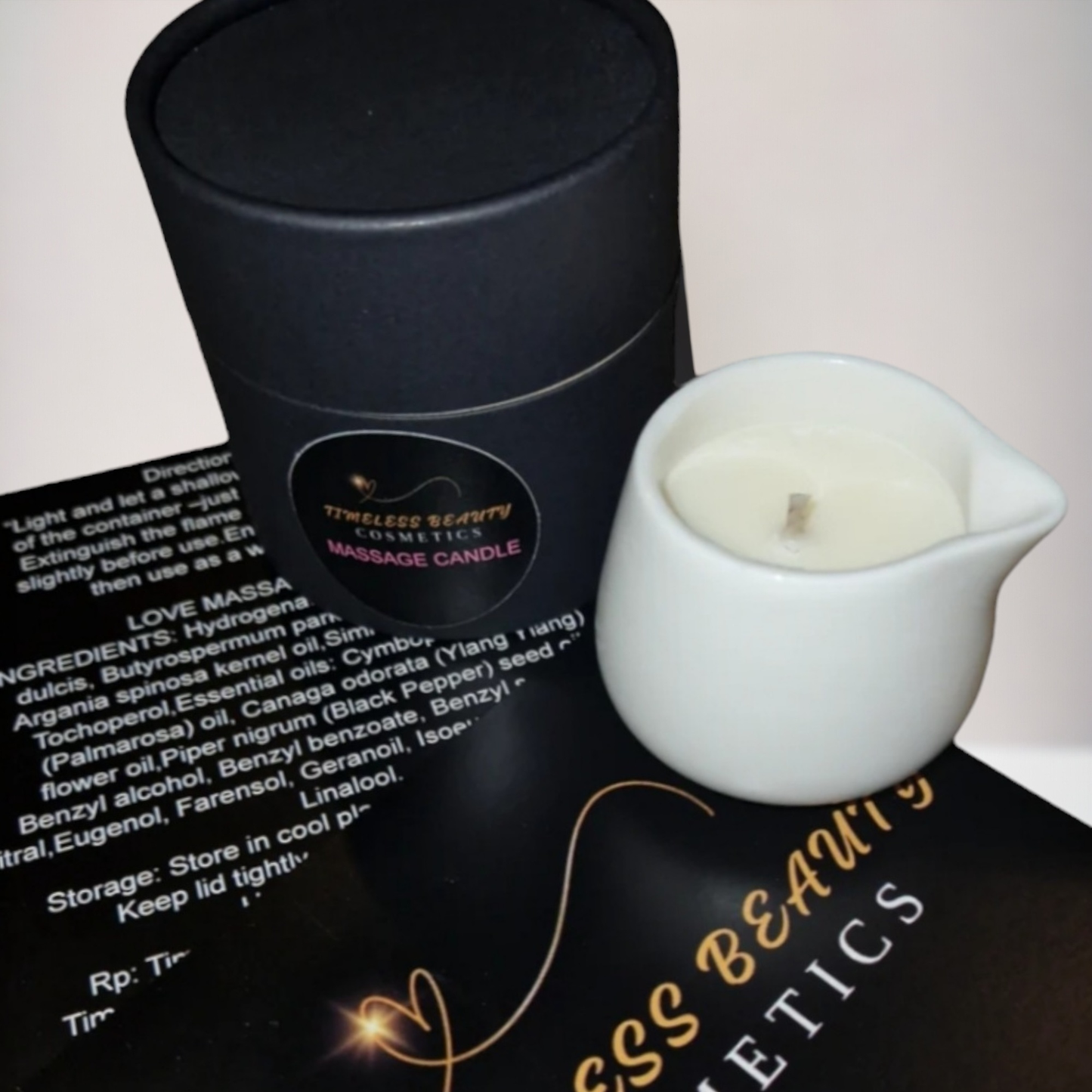 Tranquillity Relax Massage Candle with black packaging and white ceramic holder.